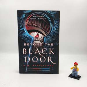 Beyond the Black Door - A.M. Strickland