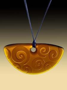 Half Rounds: Half Round Koru Pendant in Vintage Beer Bottle Amber