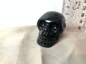 Small black obsidian carved skull 77g 2cm tall - Phyllis Brown