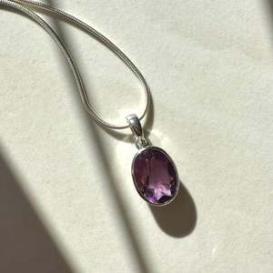 Products: Sterling Silver Oval Fancy Cut Amethyst Pendant