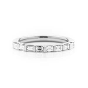 Wedding Rings Auckland: Platinum tab set Bagguette diamond wedding ring