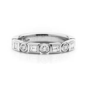 Wedding Rings Auckland: Baguette and round diamond rub set platinum wedding ring