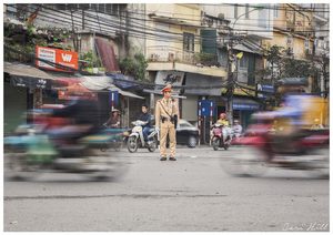 People: Directing Traffic, Hanoi, Vietnam