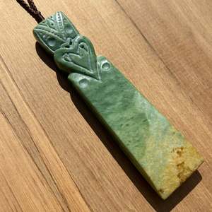 Pounamu Toki Pendants: Marsden Flower Jade Pounamu Tekoteko Toki Pendant