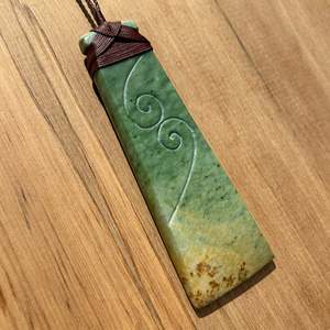Marsden Flower Jade Pounamu Toki with Koru Relief