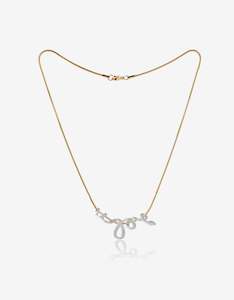 Gifts Under 200: Dreaming Serpent Gold/Silver Necklace