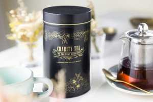 Products: Unlabeled Large Signature Black & Gold Tin - Charity Tea