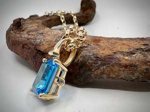 Gemstone Pendants: Blue Topaz with Horseshoes Pendant | 9ct Yellow Gold