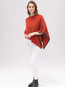 Possum And Merino Knitwear: Two Tone Poncho in Tamarillo by Merinomink