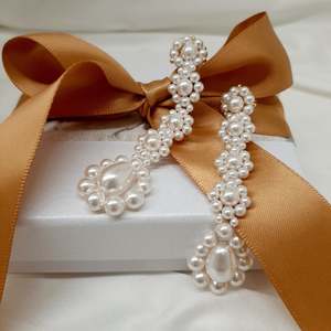 Valentina - white round and pear shaped crystal pearls cascading stud earrings