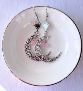 Crescent moon with crystal earrings.