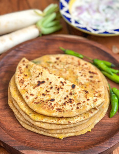 Products: Paneer Paratha - Curry Guru Tweed Street