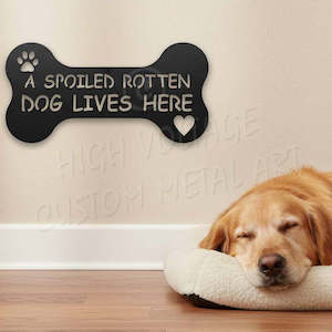 a spoiled rotten dog lives here