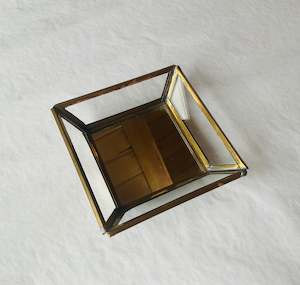 Glassware: Glass trinket dish with mirrored bottom