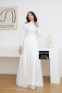 Wedding Dress: Pure White Brocade Bridal Ao Dai with Large Floral Embellishments