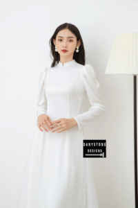 Wedding Dress: Graceful White Silk Bridal Ao Dai with Puffed Sleeves and Pearl Trim