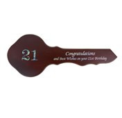 Products: Dark rimu 21st key paua 21 davyengravers