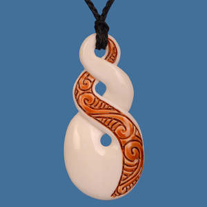 Maori Bone Carvings: Bone Double Twist with Stain Pendant