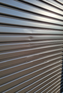 Semi Industrial: 4200mm high x 4040mm Garador Commercial Roller Door Ironsand - DAMAGED - WINDLOCKED - AVAILABLE IMMEDIATELY