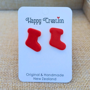 Products: Red Santa Sock Stud Organic Skincare NZ