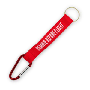 Apparel And Accessories: Remove Before Flight Keychain with Carabiner