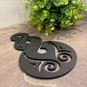Products: Black pikorua art