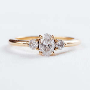 Wedding Rings: Oval and Round Three Stone