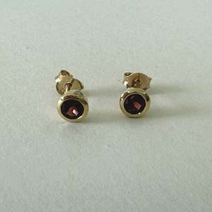 Earrings: Rubover Set Garnet Studs