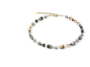 COEUR DE LION NECKLACE, GOLD PLATED ST/ST GEO-CUBE IN BLACK/GOLD & TITANIUM OXID&hellip;
