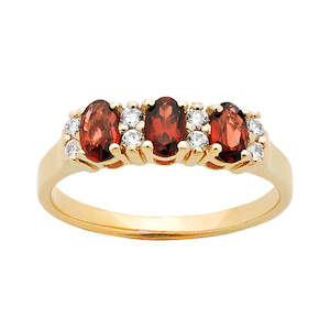 Coloured Gems Rings: 9K YELLOW GOLD Diamond accented Garnet Ring
