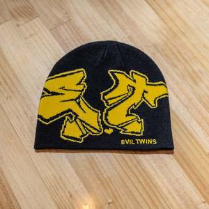 Private Evil 2 0 Merch Drop: Evil Twins Beanie