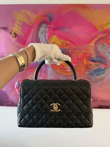 3000 5000: Chanel Coco Top Handle Flap Bag in Black Caviar Leather