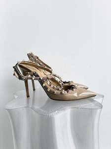 100 300: Valentino Garavani Rockstud Caged Pumps