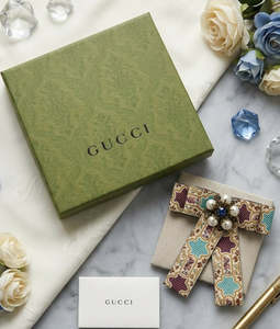 100 300: Gucci Jacquard Bow Brooch