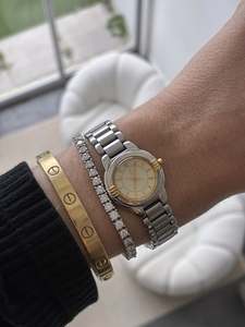 Yves Saint Laurent Bi-Tone Sunburst Dial Watch