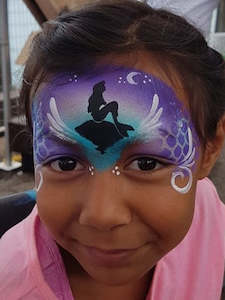 Mermaid on rock stencil