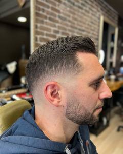 Skin Fade Haircut And Beard Styling