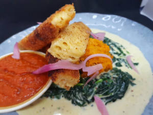 Products: Crispy Macaroni Bites, Creamed Spinach & Salt-Baked Kumara (V)