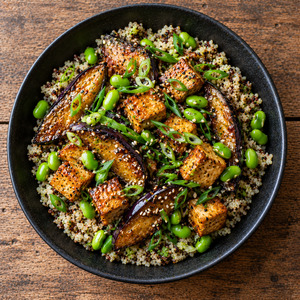Miso-glazed eggplant & crispy tofu with sesame quinoa & edamame.