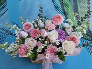 EA0526 pastel flowers in basket - Flavells Floral Boutique