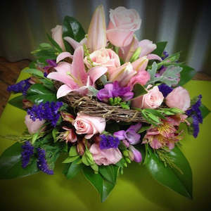 arrangement: Round Posy Bowl Arrangement in Soft Colours.