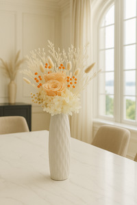 Products: Light Orange Roses Arrangement in a tall vase Flower Boutique