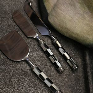 Sale Items Excluiding Floral And Giftcards: CHECKER BLACK & WHITE BONE AND STAINLESS STEEL CHEESE SERVER SET (2PC PER SET)