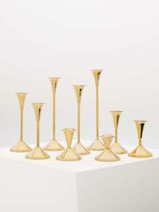 Set of Nine Candlesticks in Brass