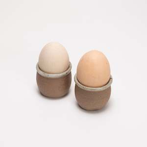 Under 50: Egg cup by Driving Creek Pottery made in the Coromandel, Aotearoa, two colours