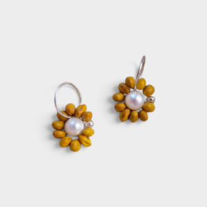 Jewellery: Daisy sleepers by Avara Studio made in Tāmaki Makaurau, Aotearoa