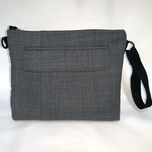 Contain Carry: Well-Suited Bag