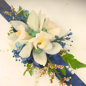 School Ball Hamilton Corsage: Cream Orchids with Royal Blue Wrist Corsage