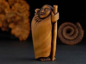 Talking with Tui carving by Doug Marsden