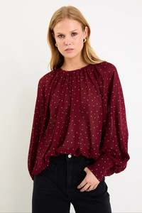 Stories Be Told: Cosmopolitan Burgundy Polka Dot Crew Neck Floaty LS Top - Burgundy Polka Dot
